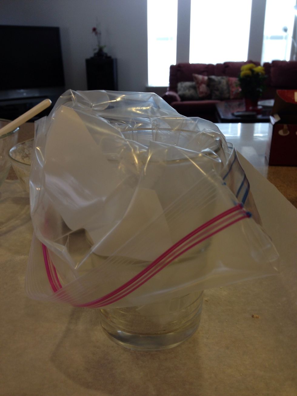 Next use a piping bag or like me, you can place a ziploc bag into a cup and transfer the mixture over.