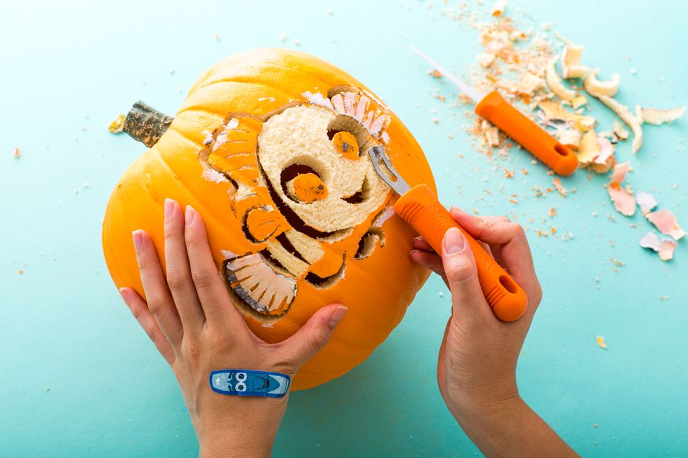 Next, use the shading tool to carve your outlines and remove the bulk of your design. Be sure to carve deep enough so light will shine through.