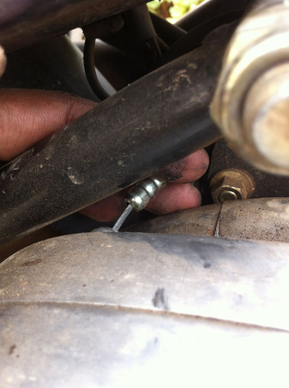 Next using your finger guide the cable to get seated in the sleeve