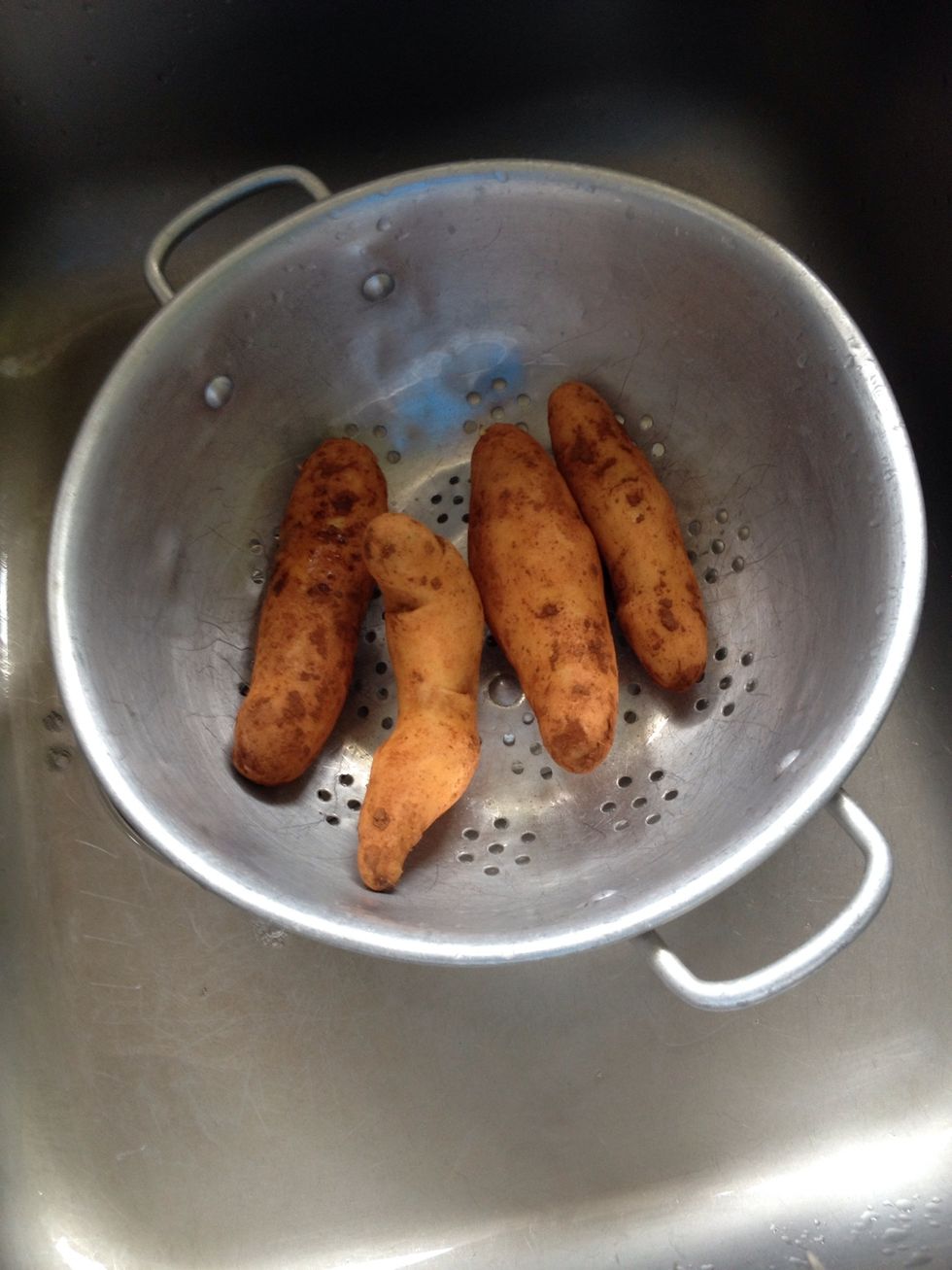 Next wash some potatoes