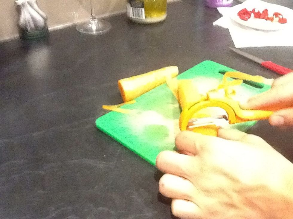 Next we move on to carrots where we remove both ends and peel away the skin