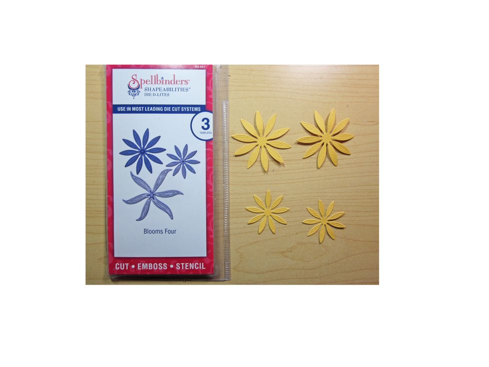 Next we need to make our paper sunflowers.  Using the Blooms Four die from Spellbinders cut out the large and small petals.