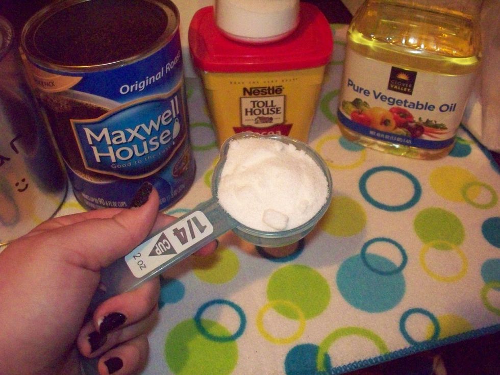 Next we need to put 1/4 cup of sugar into the mug. If you're diabetic, you may want to add less, or substitute!