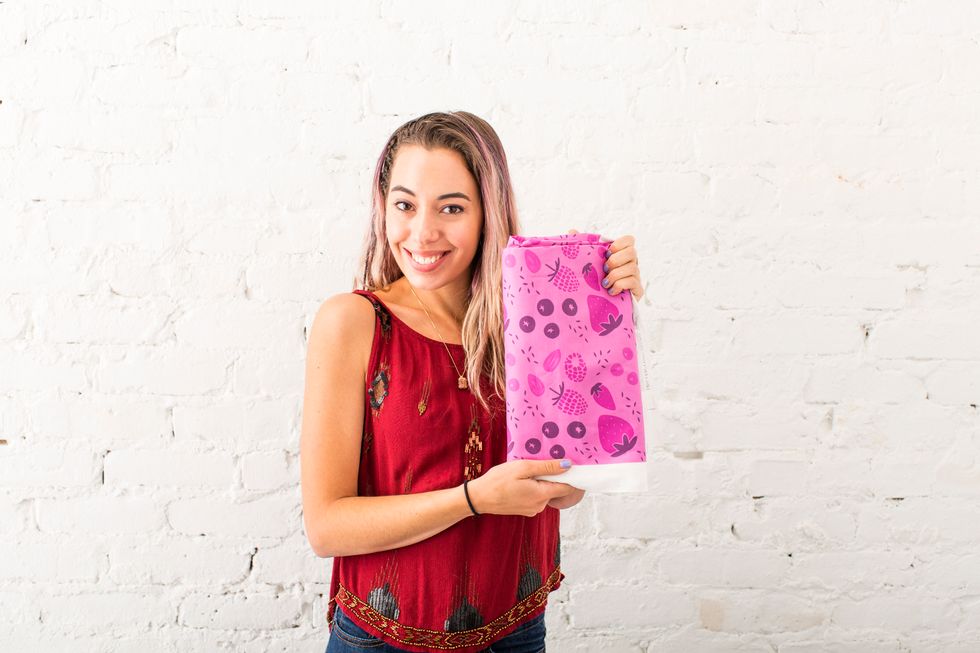 Next, we printed our art print onto jersey fabric with the help of Spoonflower, then handed it off to our sewing pro to make a dress.