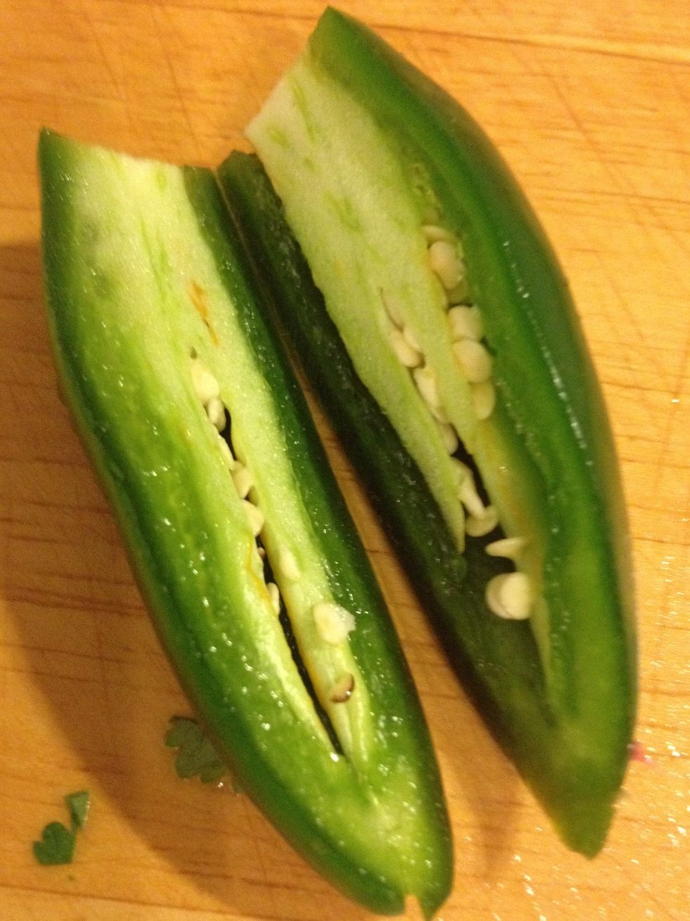 Next we're going to add jalape\u00f1o peppers. If you don't like heat you don't have to use these. You can also just use green peppers as well. Or both.