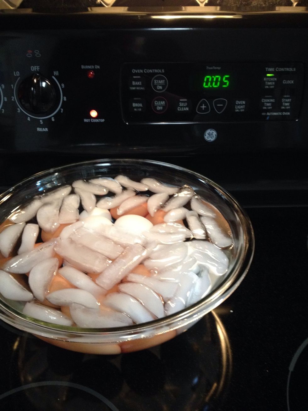 Next, we're going to shock the eggs in a COLD water ice bath to separate the membrane from the shell.  So, remove the eggs from their hot water and put them in a bowl of ice water for five minutes.
