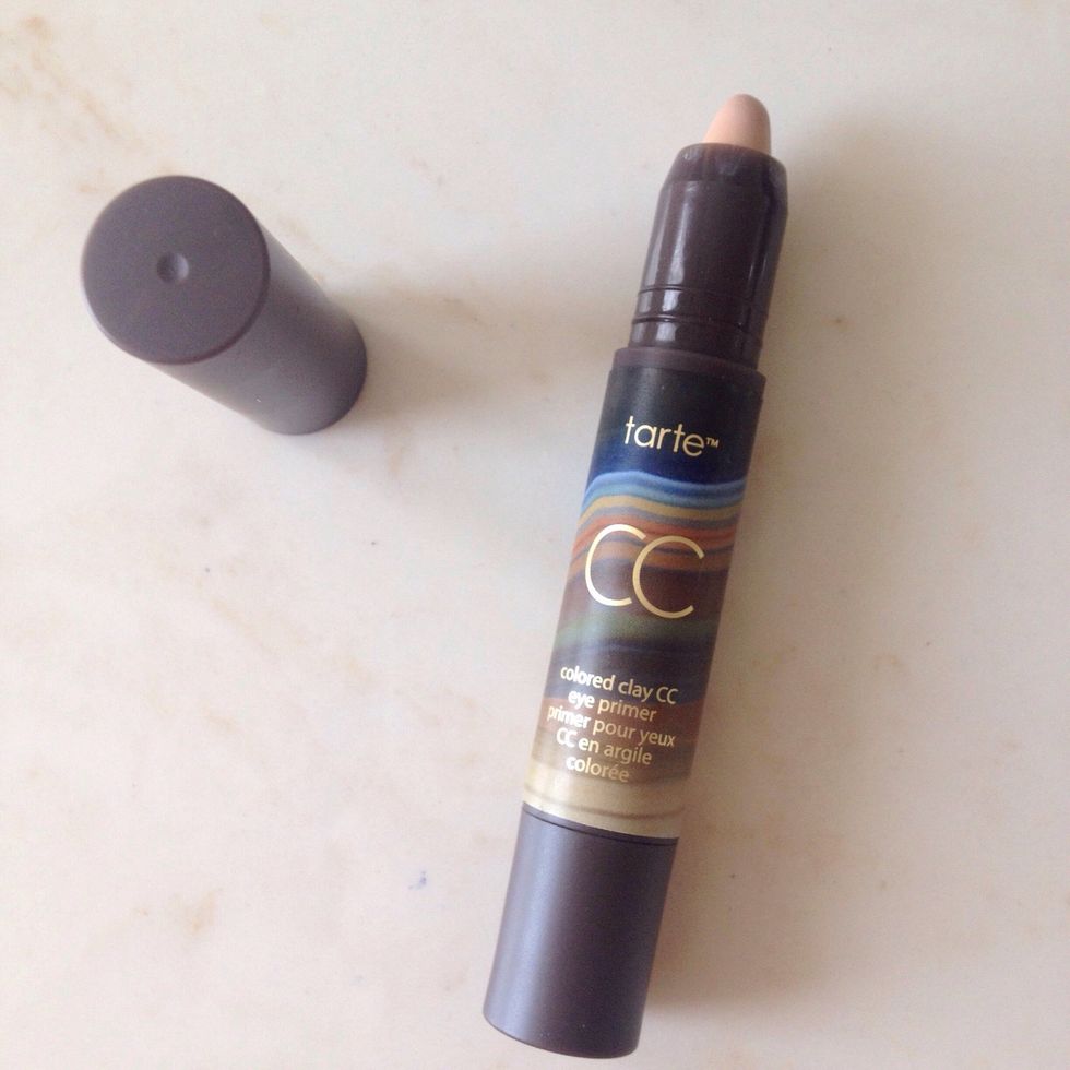 Next we're going to start with the eyes, prime your lid with a eye shadow primer. This one here is a rarte CC one that's skin color.