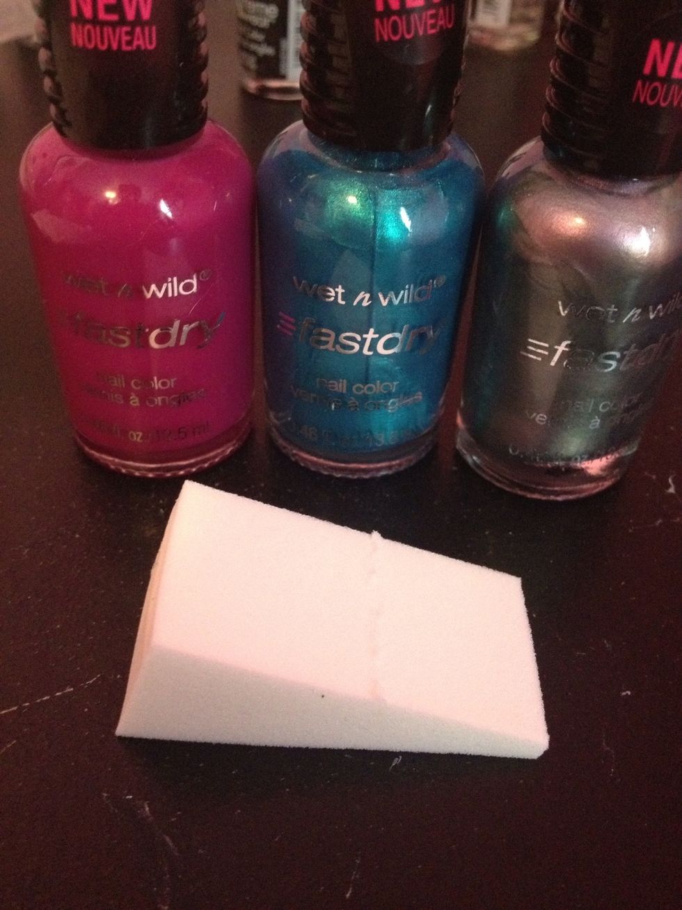 Next, we sponge! I used Wet n Wild "Teal or No Teal (227C)", "Gray's Anatomy (237C)" and "Fushiarama (232C)". I also mixed some of Sally Hansen's "Wet Cement (37)" with the gray.