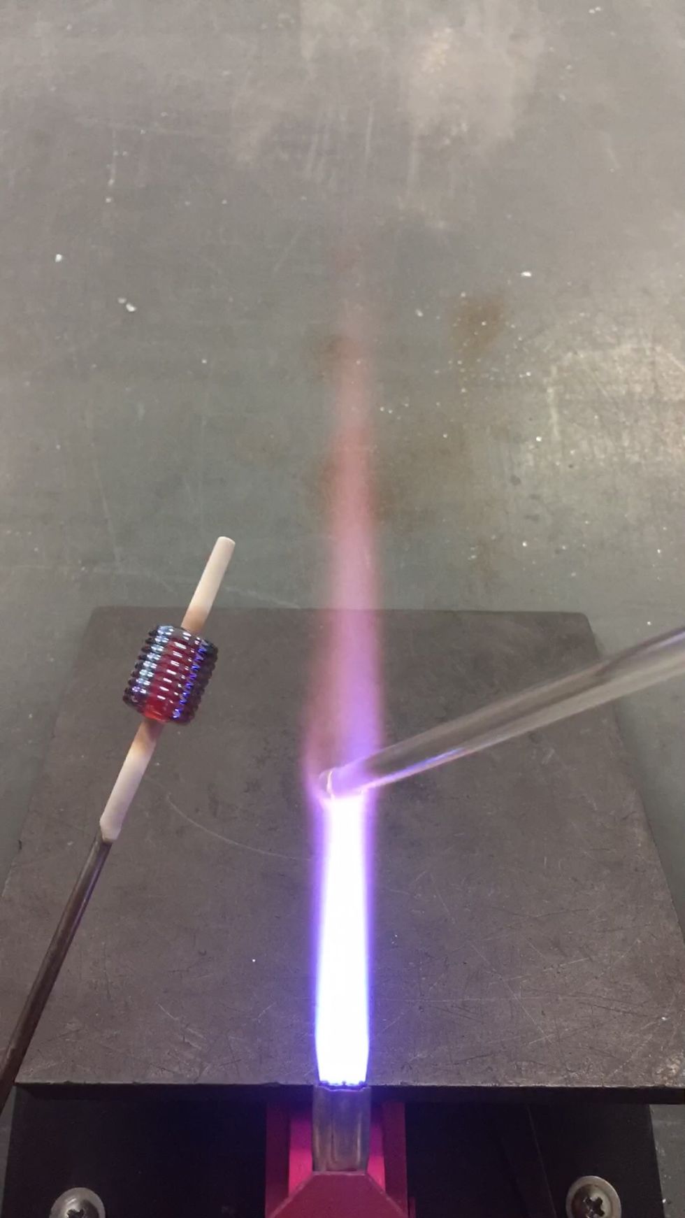 Next we will apply the first layer of Zephyr. The trick to maintaining the metallic layer is to keep it out of the flame until it's been encased.