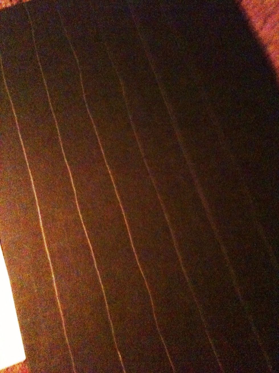 Next, with the remaining of your second board, measure out five 1 inch horizontal strips. These will create a lip for your shelves so that your polishes won't fall off.