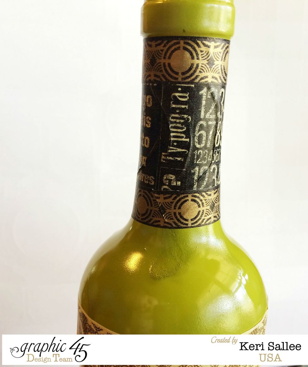 Next, wrap the neck of your bottle with 2 styles of Graphic 45 Washi Tape.