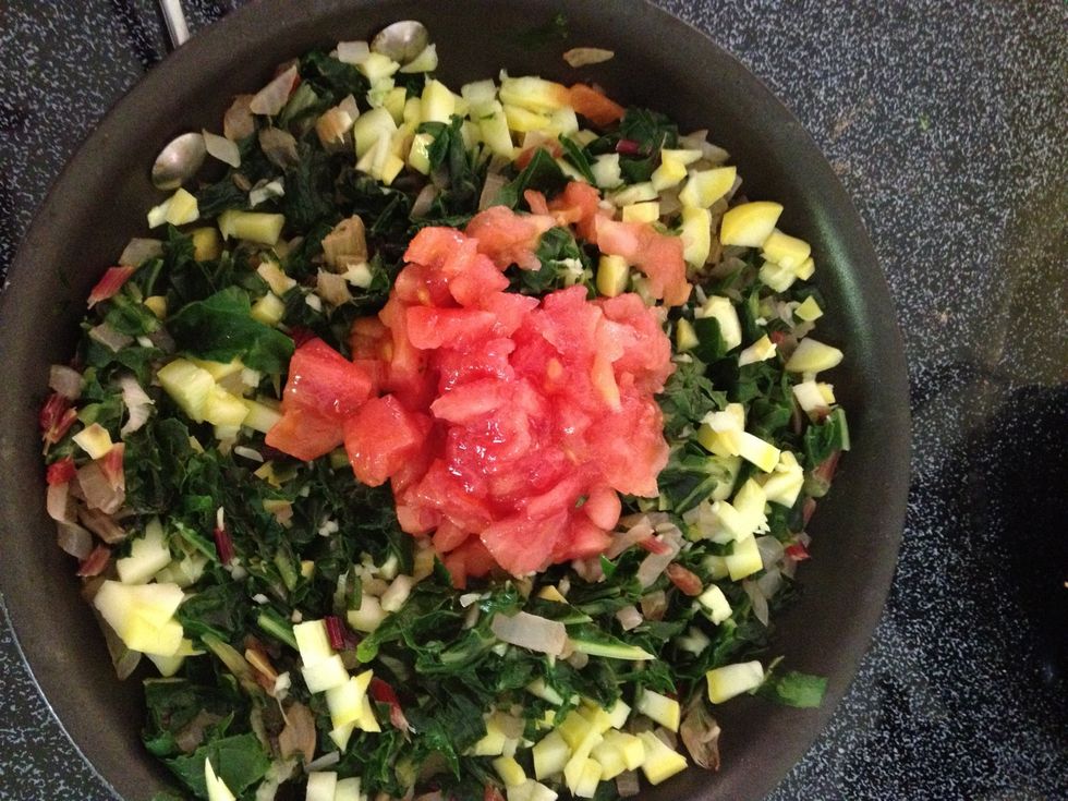 Next you are going to add the garlic, lemon juice, salt & pepper and diced tomatoes. Saut\u00e9, uncovered, on medium heat until tomatoes cook down. Set aside.