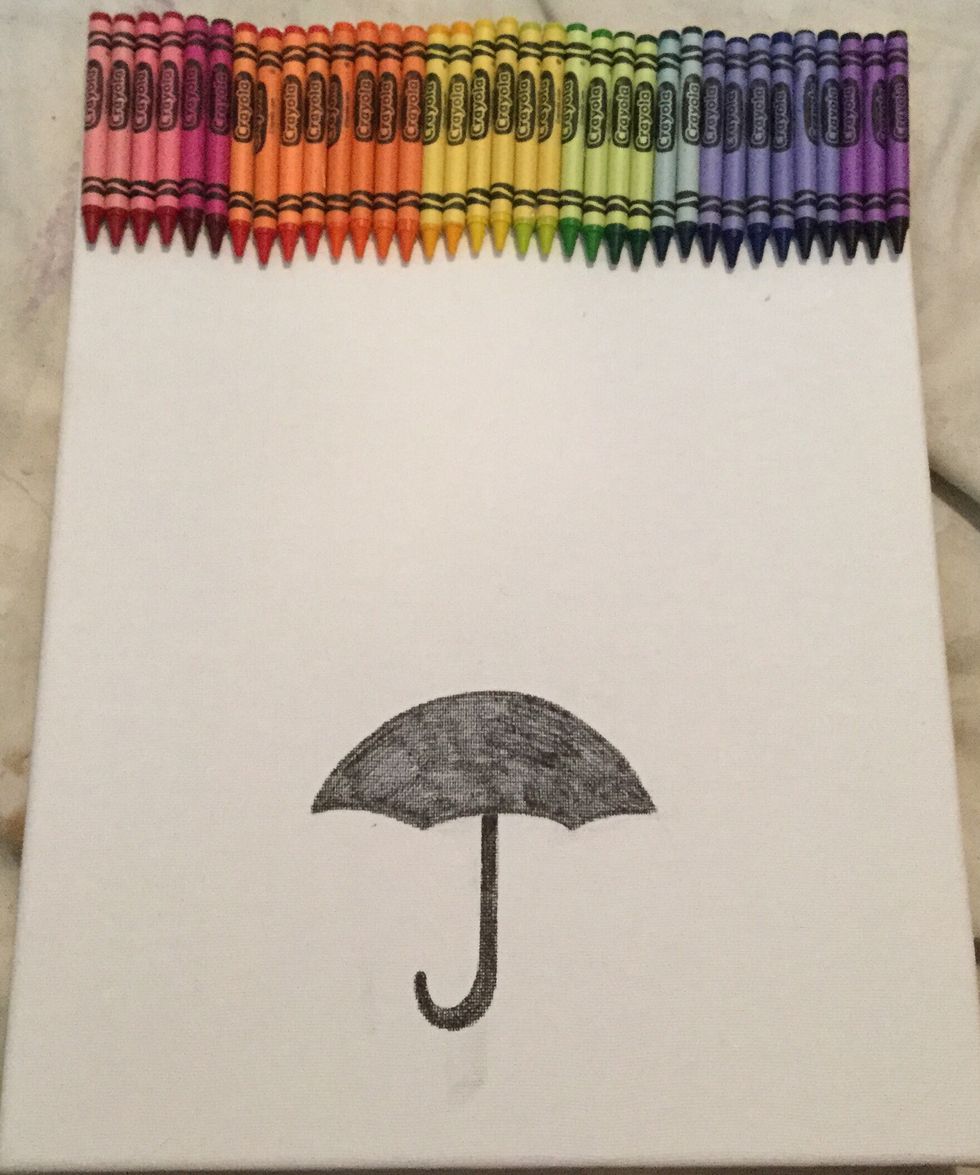 Next you are going to glue on your crayons. I will be arranging my crayons in rainbow order but you can arrange them however you want.