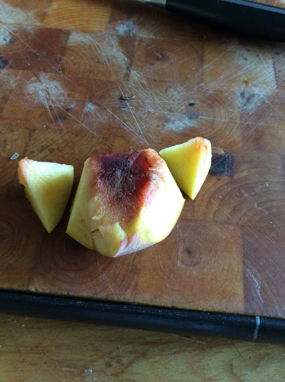 Next, you cut the top corners of your peach .