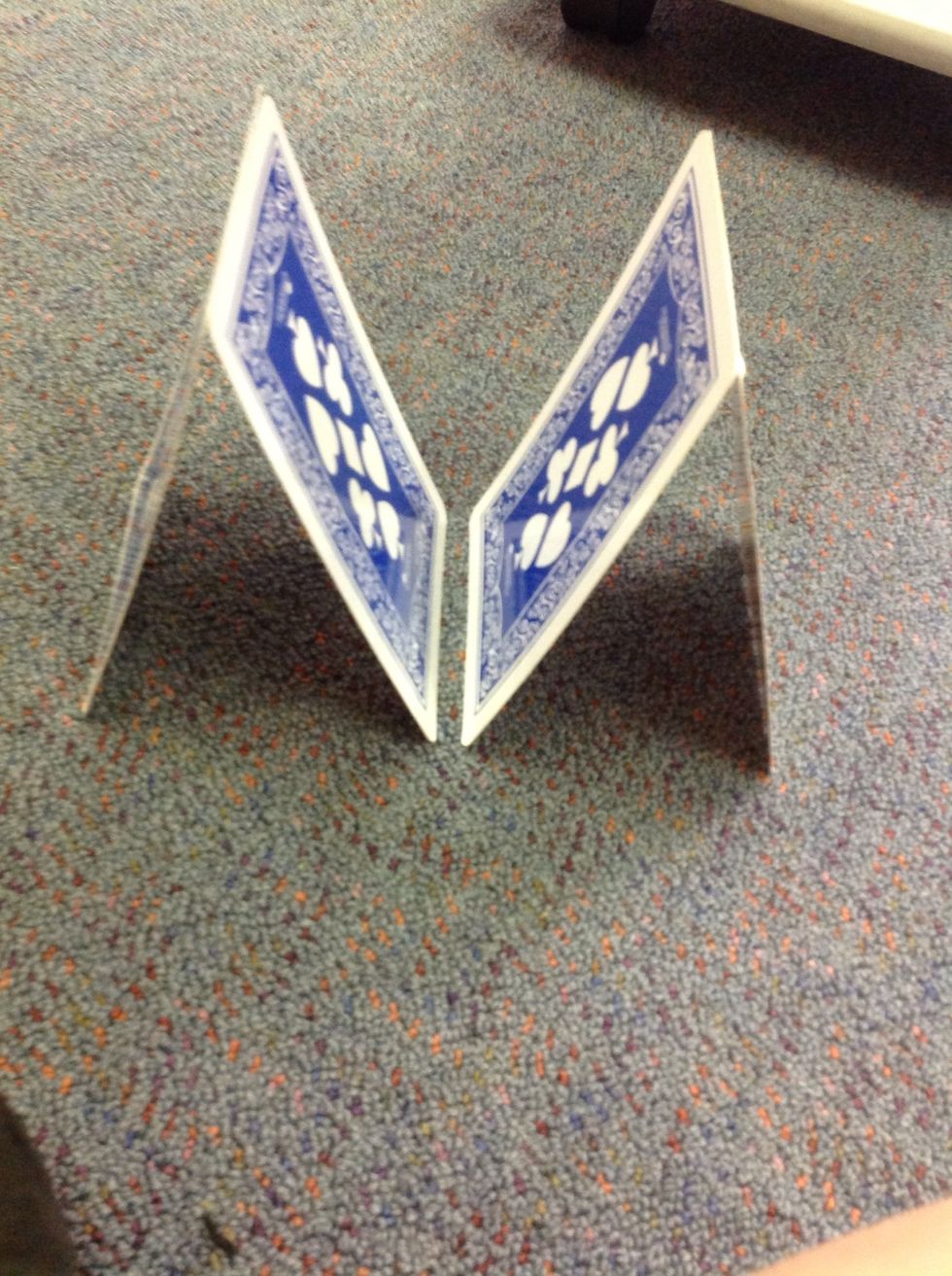 Next you get another two cards and do the same but put them next to each other