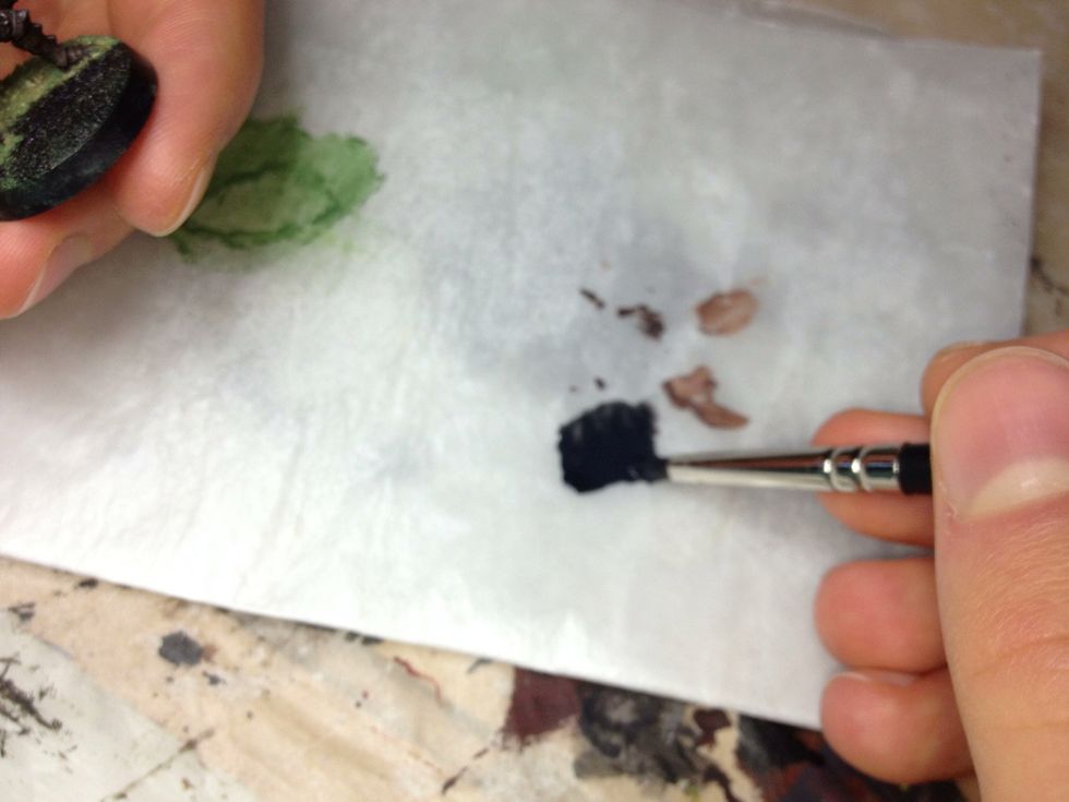 Next you'll be priming the base. I use a special primer from a hardware store, but if it's easier you can just use Citadel's "Imperial Primer".