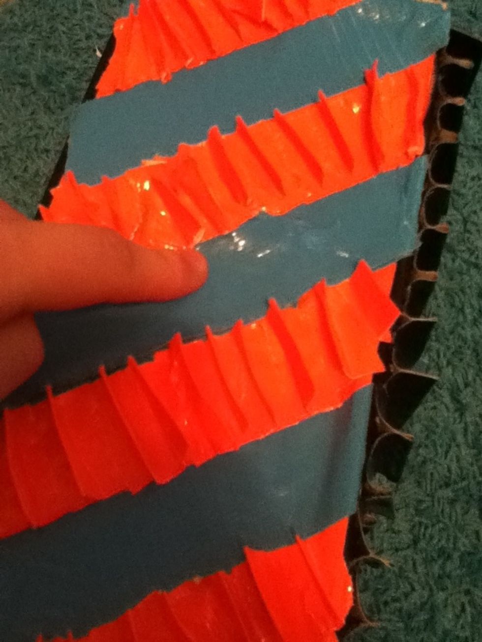 Next you need to cover the hole. To do so, measure another piece of tape to cover the hole. Make sure you push the flap all the way in so it won't open.