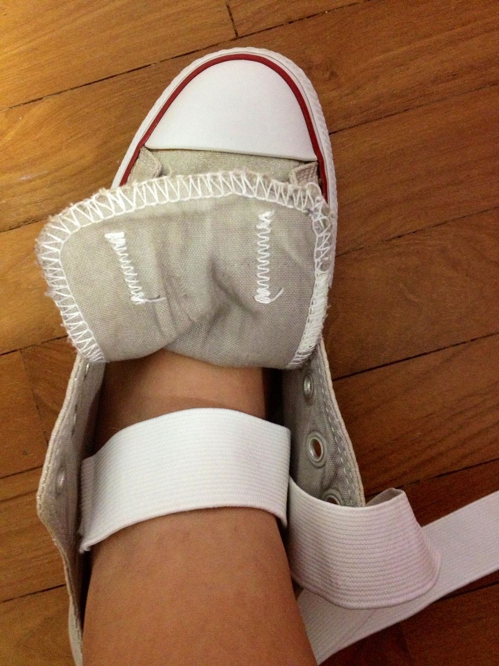 Next you need to measure the amount of elastic you need for your ankle. Ideally it should be as tight as Mary-janes. Cut two pieces of elastic, of equal length, for both sides of the shoes.