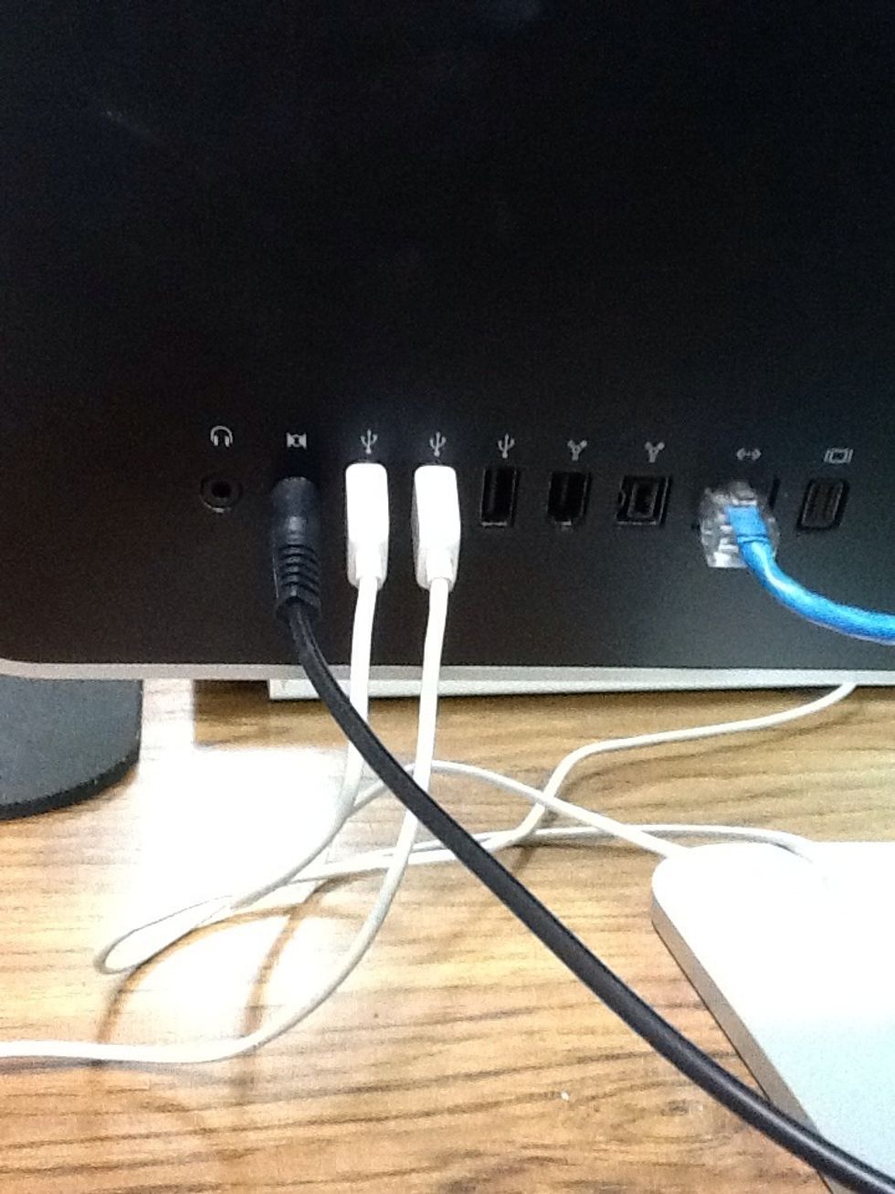 Next you need to plug one end into the back of the computer