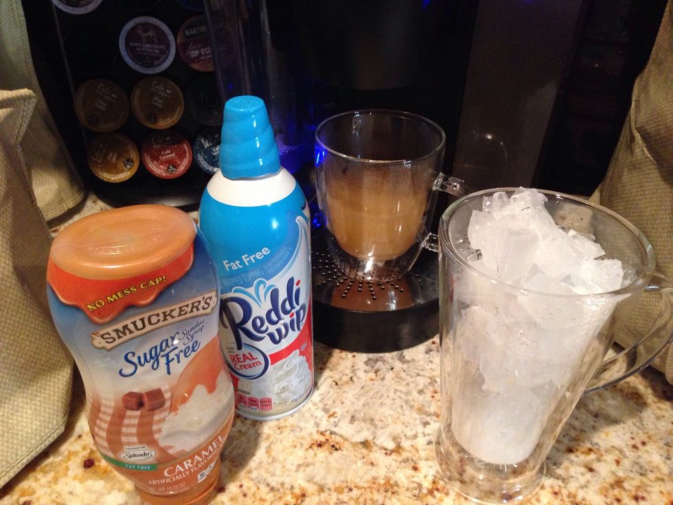Next, you need your cooled cider, glass of ice (with milk), whipped cream and caramel sauce.