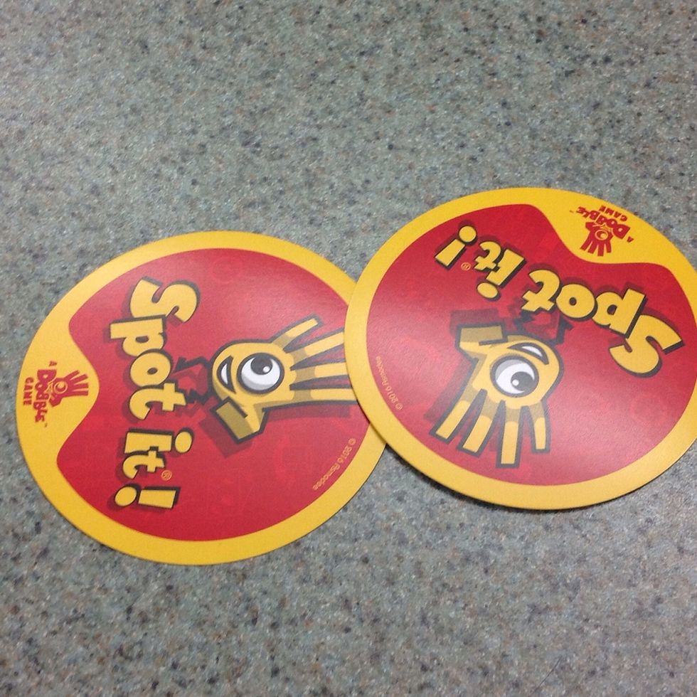 Next you place down 2 cards. On the count of three you both flip the cards over.