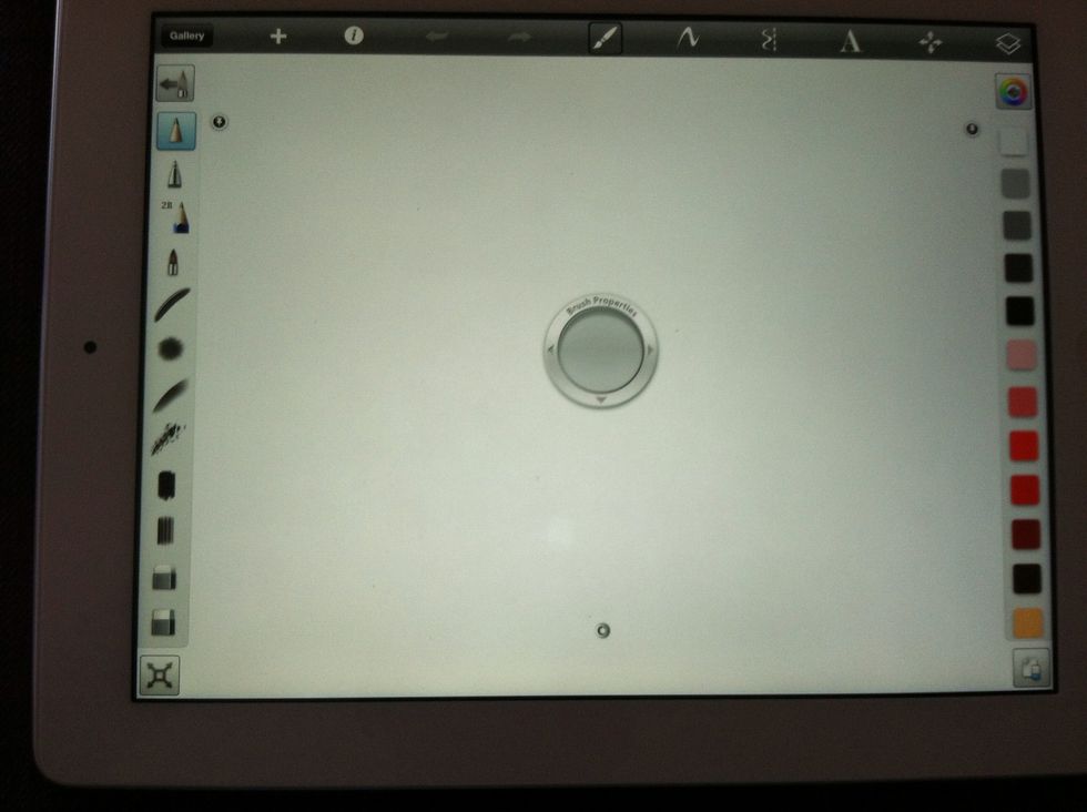 Next you're taken to a blank page to start. You tap on the white "puck" in the center to bring up your tools, (left) your color swatches, (right) and your settings. (top) Select the pencil tool (left)