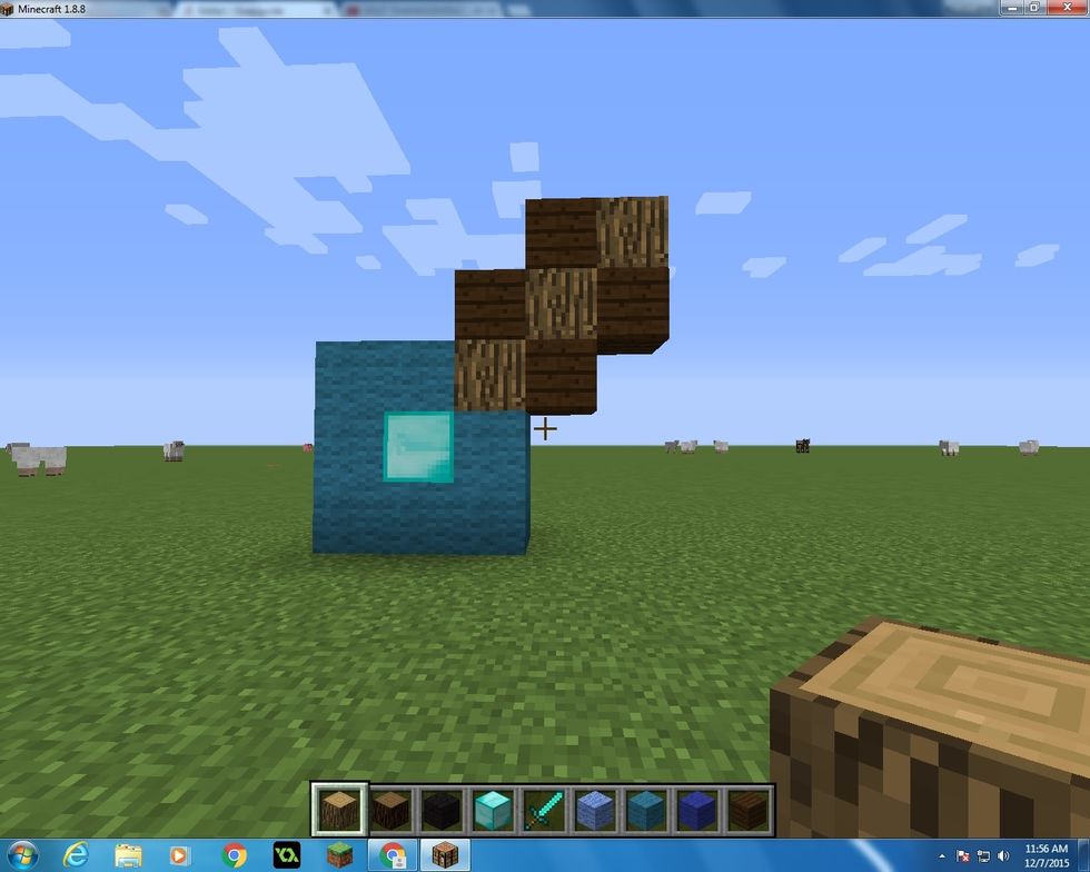 Next you want to take 4 Dark Wood Planks and 3 Oak Wood Blocks, and make this.