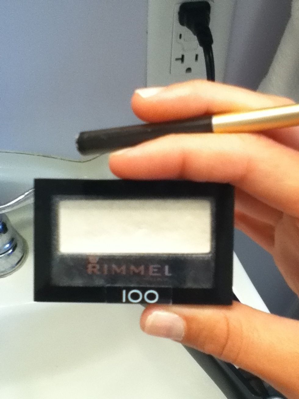 Next you will apply your white eyeshadow. A slight shimmer will add a gentle boost!
