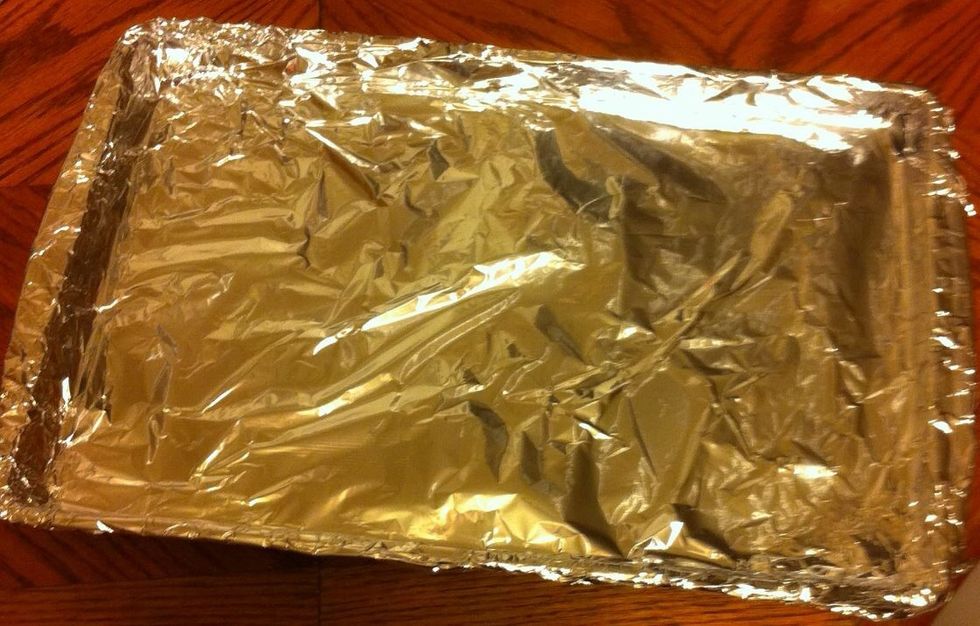 Next, you will line your baking pan with aluminum foil and coat it with non-stick spray. You can set this aside while we move onto the next step.