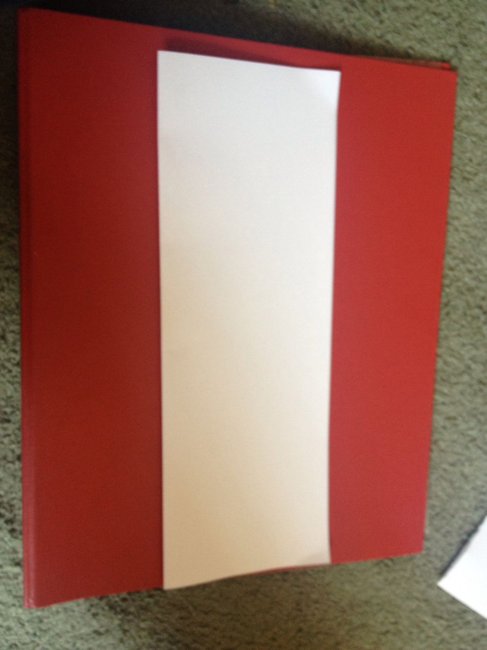 Next you will need to file your paper in half horizontally.