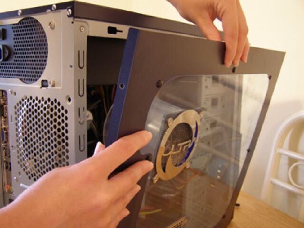 Next, you will need to remove the side panel off your PC  (there may be screws in the back of the computer that you will need to take out)