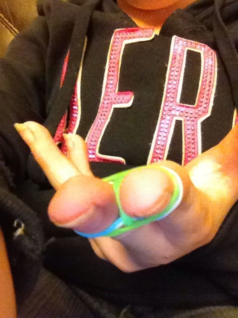 Next you will put another green one on or whatever color was the figure eight