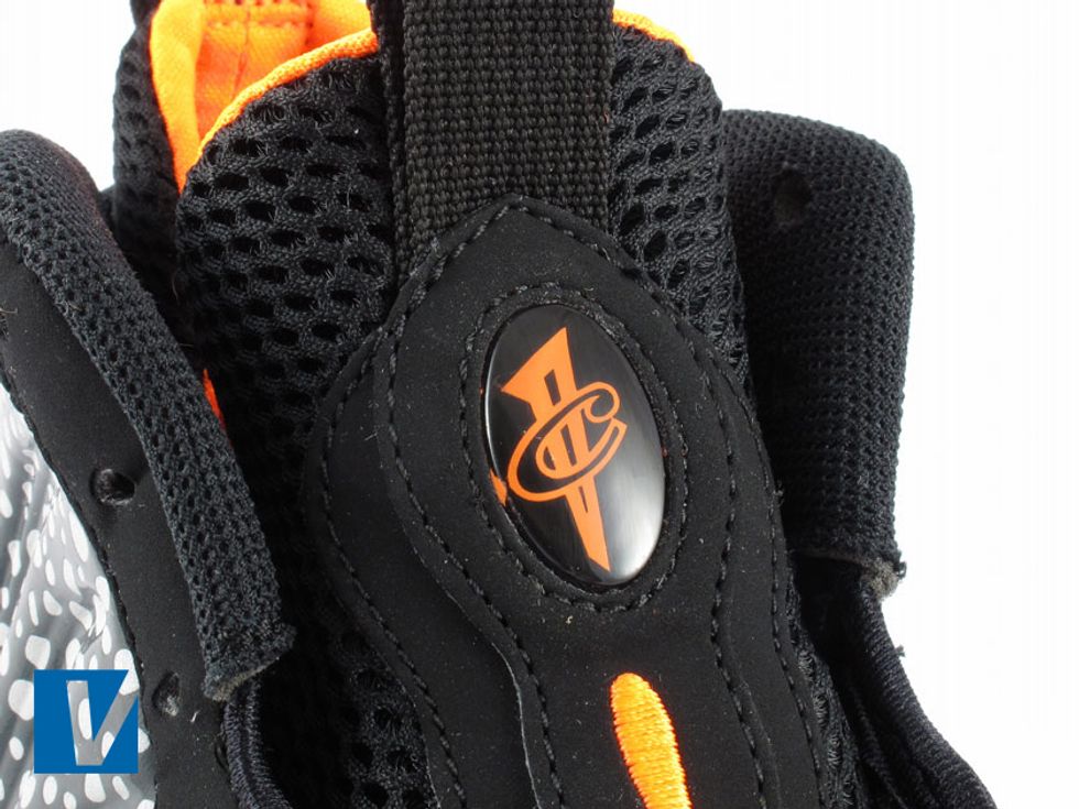 Nike Foamposite 1's feature a logo button on the tongue. Check the quality of the button and the printing of the logo. Also check that the stitching on the tongue is even, tight and high quality.
