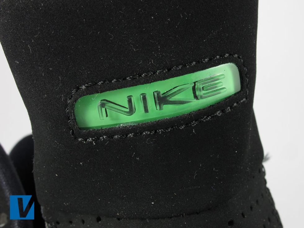 Nike Zoom Hyperflights feature a Nike logo moulded into clear plastic on the tongue. The word Nike is both embossed into the clear plastic and then printed behind that embossing.