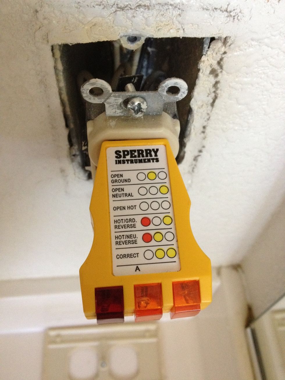 No lights, no power - now we can get busy. There were lights on the tester and then, after I flipped the breaker, the lights went off, so I am very comfortable that there is no power to this outlet.