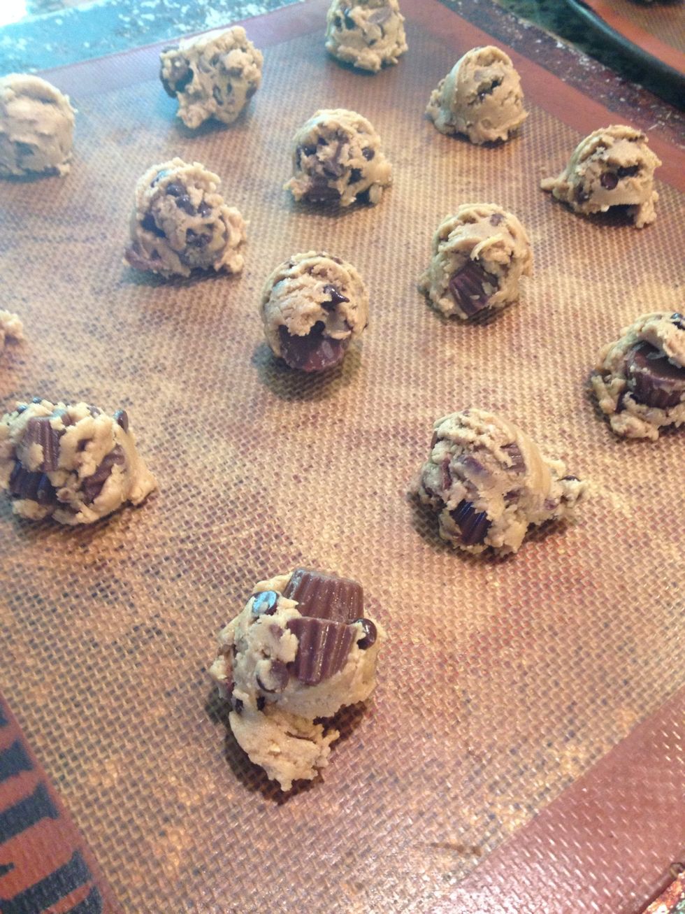 No need to leave space for them To bake. Pile on evenly. Bc of the dough these cookies keep their shape perfectly and don't spread