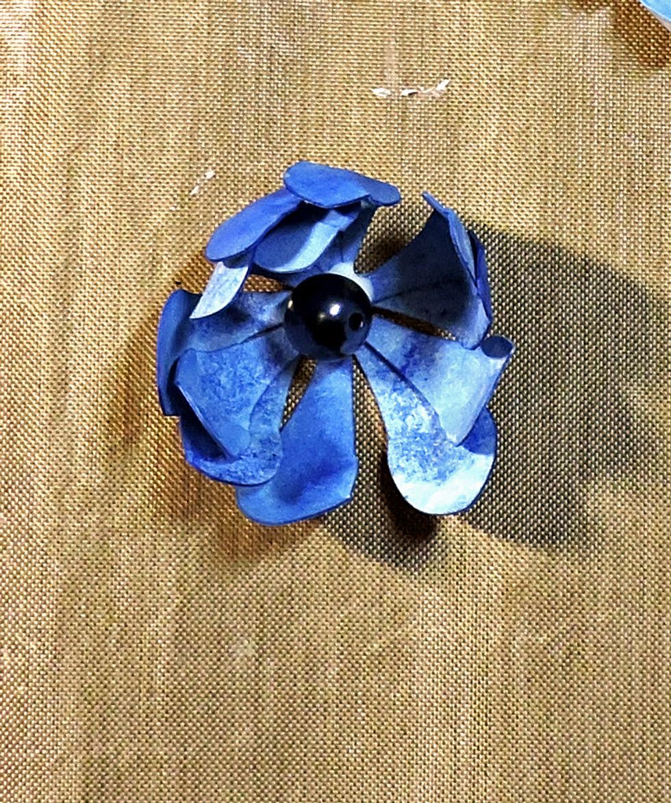 No stamens? How about pearls or buttons or brads?