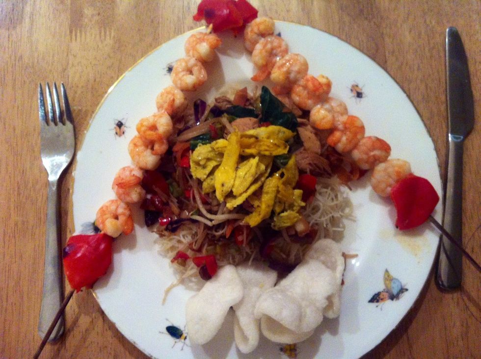 Noodles first stir fry next prawn crackers and place kebabs down edges