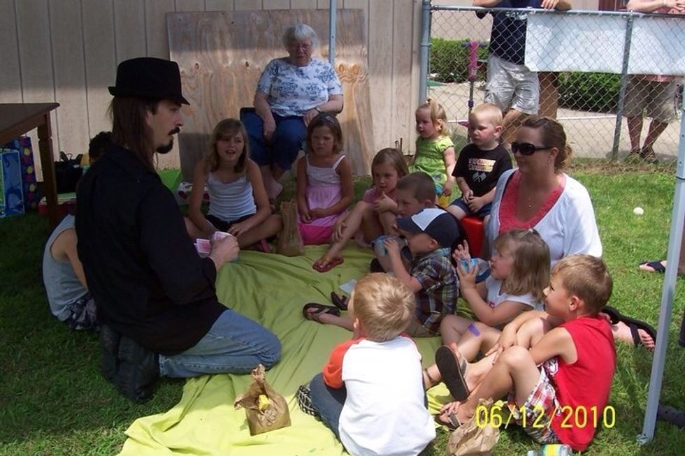 Not all magic shows are alike. Here I decided it was best in this situation for me to just sit with the kids and do magic. The kids loved it and that's all the magician is there for.