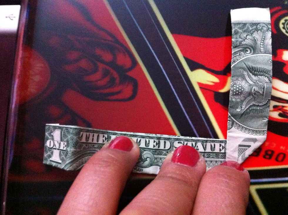 NOTE: Fold up to other letters in between to ur LEFT if u want the ring TIGHTER. Fold in between letters more towards the RIGHT side to make the ring hole more LOOSE.