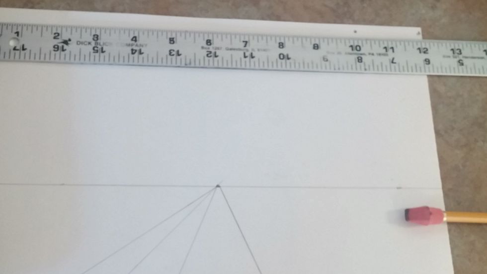 NOTE: Ignore the 2nd line in the bottom, this is adressed in the next step. Place your ruler at the very top left to right. Make a dot at the 10 inch mark.