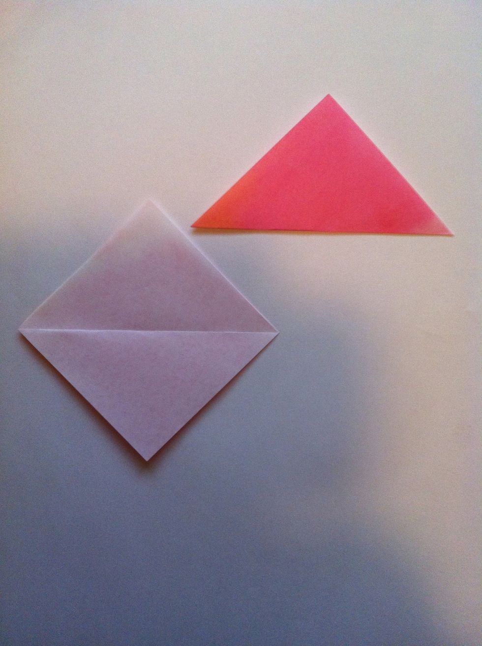 (Note: The left side will show previous step & crease to current step. Right side will show what it looks like after you do current step). Fold in half diagonally. Unfold.