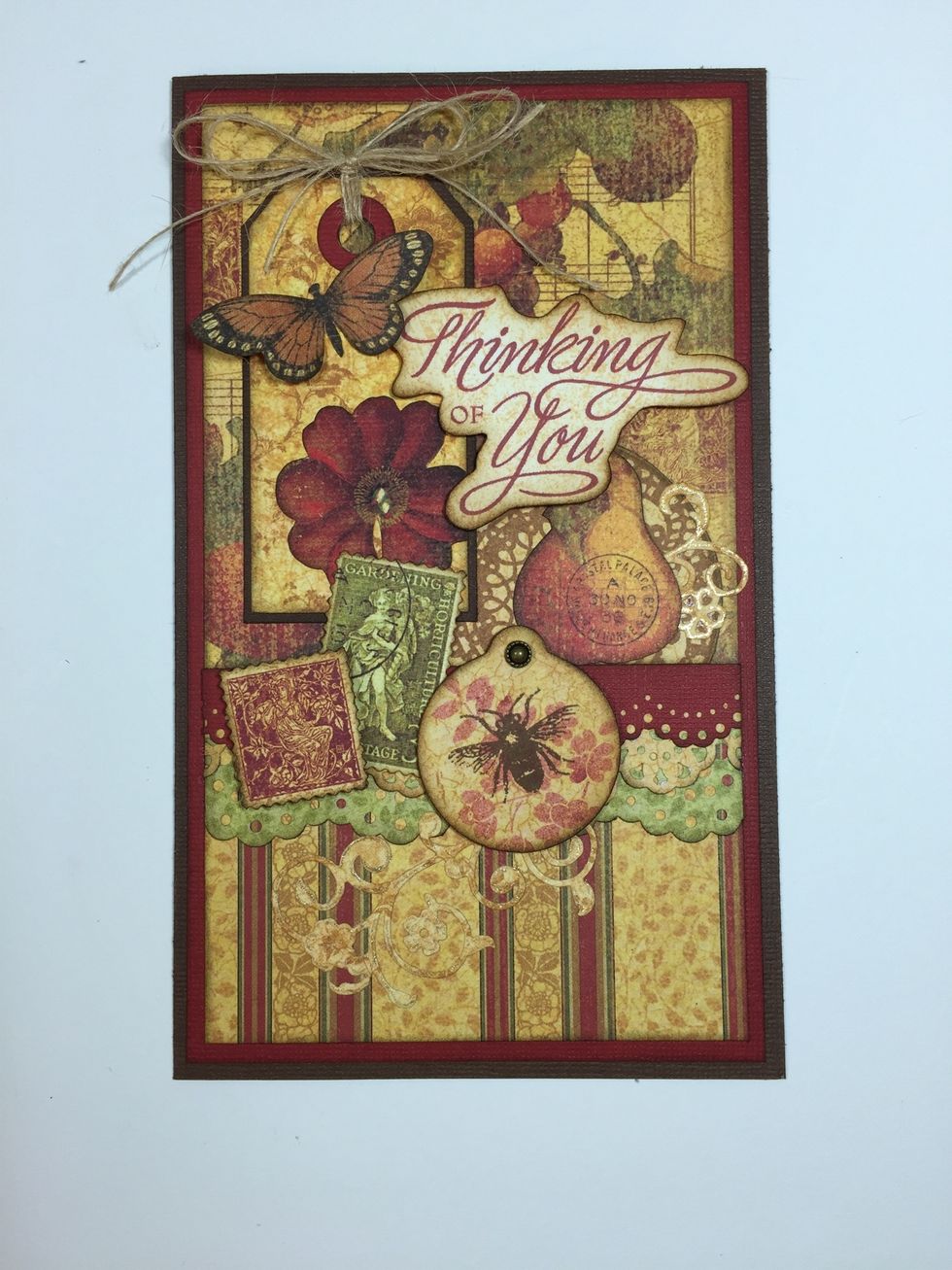 Notice how almost everything is overlapping? That's the key to layering. Many of us make the mistake of spreading things all over our card, and wonder why it doesn't have an appealing look.