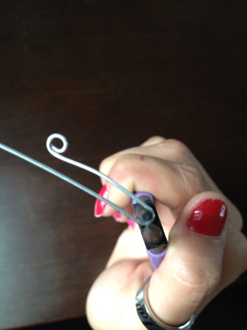 Notice how I released and moved the wire. Finish off the loop.