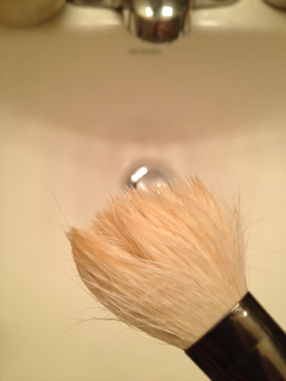 Notice how the brush hair is all askew?  Using your fingers, GENTLY re-form and smooth the hairs back to their original shape.