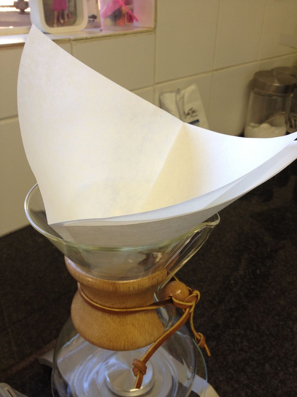 Notice how the paper rests in the coffee maker