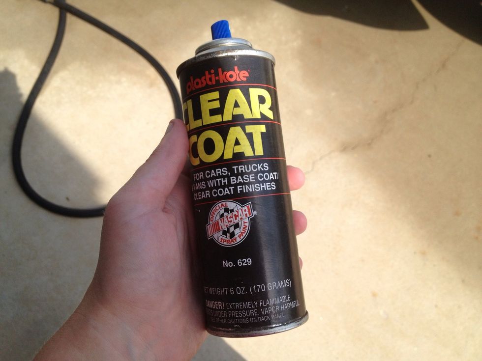 Notice my clear coat says NASCAR paint! Lol I think that means it will make my car go faster?! Lol any clear coat will do though! Tape off your headlight and start spraying an even coat of clear coat