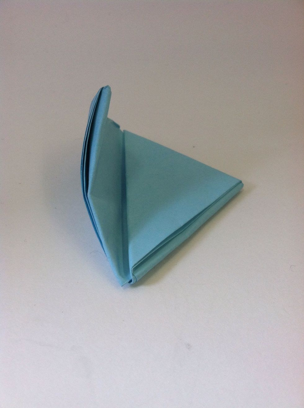Notice one of these triangle is thinner, and more flexible than the other. Curl the flexible side.