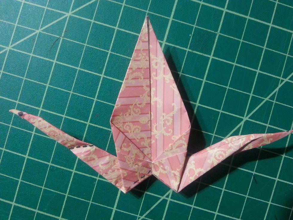 Notice the dotted line on the left flap, that is where we will fold it down along that line. This step is similar to step #19 & 20.