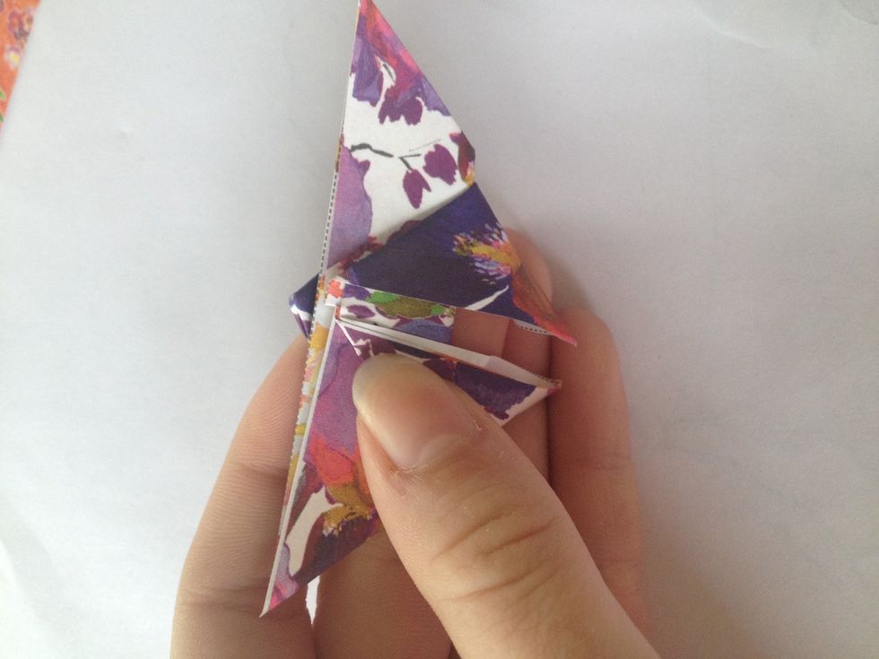 Now a tiny triangle will peek over the top